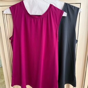 Set of Two Athleta Women's Sleeveless Tunic Tees in Magenta and Grey.
